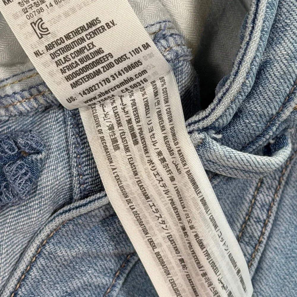 Abercrombie & Fitch Womens Medium Wash Denim Mini Skirt Raw Hem High Low Size 25